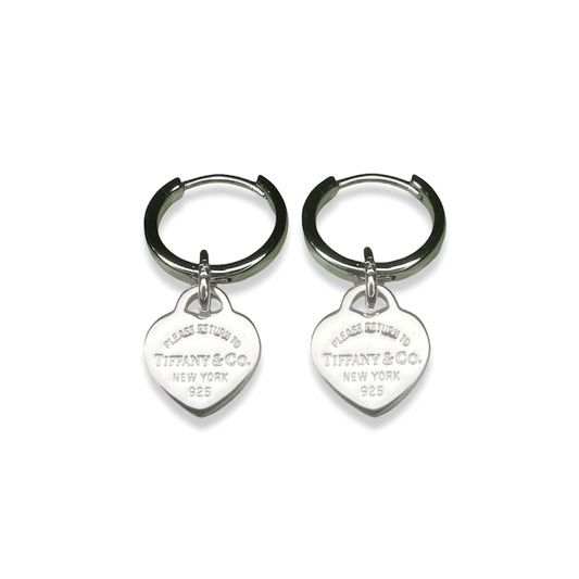 Tiffany & Co. earrings (heart pendants on unbranded creoles)