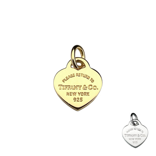 Tiffany & Co. gold heart pendant with a unbranded eyelet