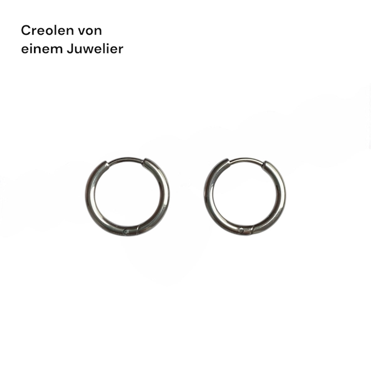 Tiffany & Co. silberne Herzanhänger an extra Kreolen