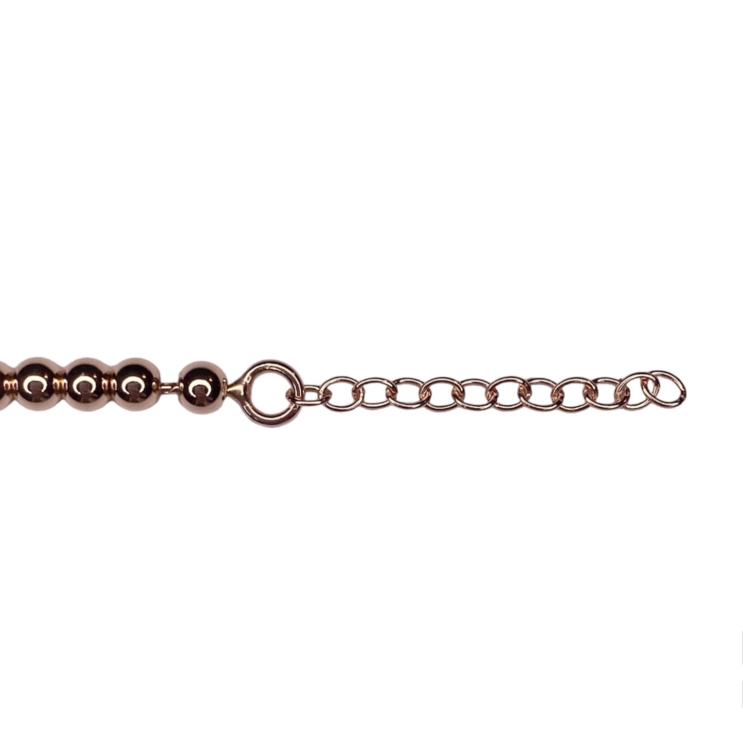 Tiffany & Co. heart pendant on a  unbranded ball bracelet in roségold
