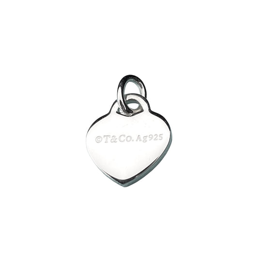 Tiffany & Co. silver heart pendant with a unbranded eyelet