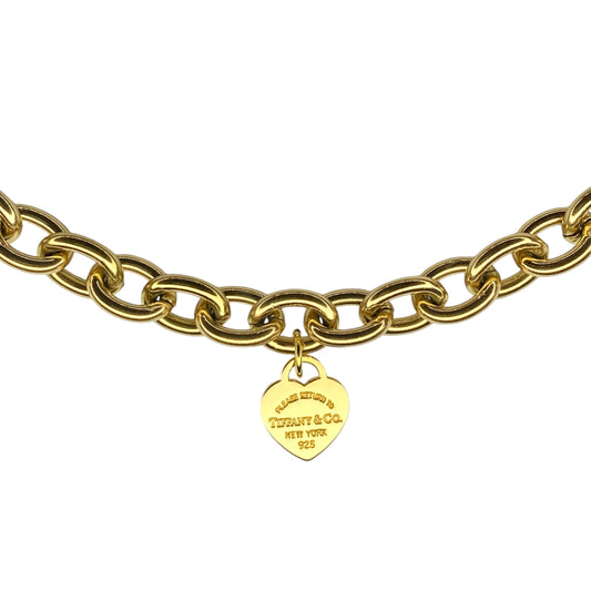 Tiffany & Co. gold heart pendant on unbranded link chain, adjustable