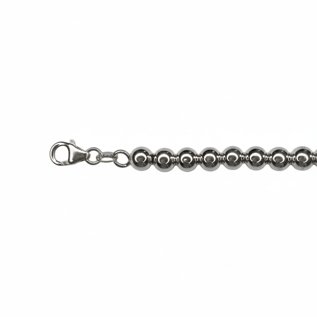 Tiffany & Co. bracelet ( Tiffany heart pendant on unbranded ball bracelet)