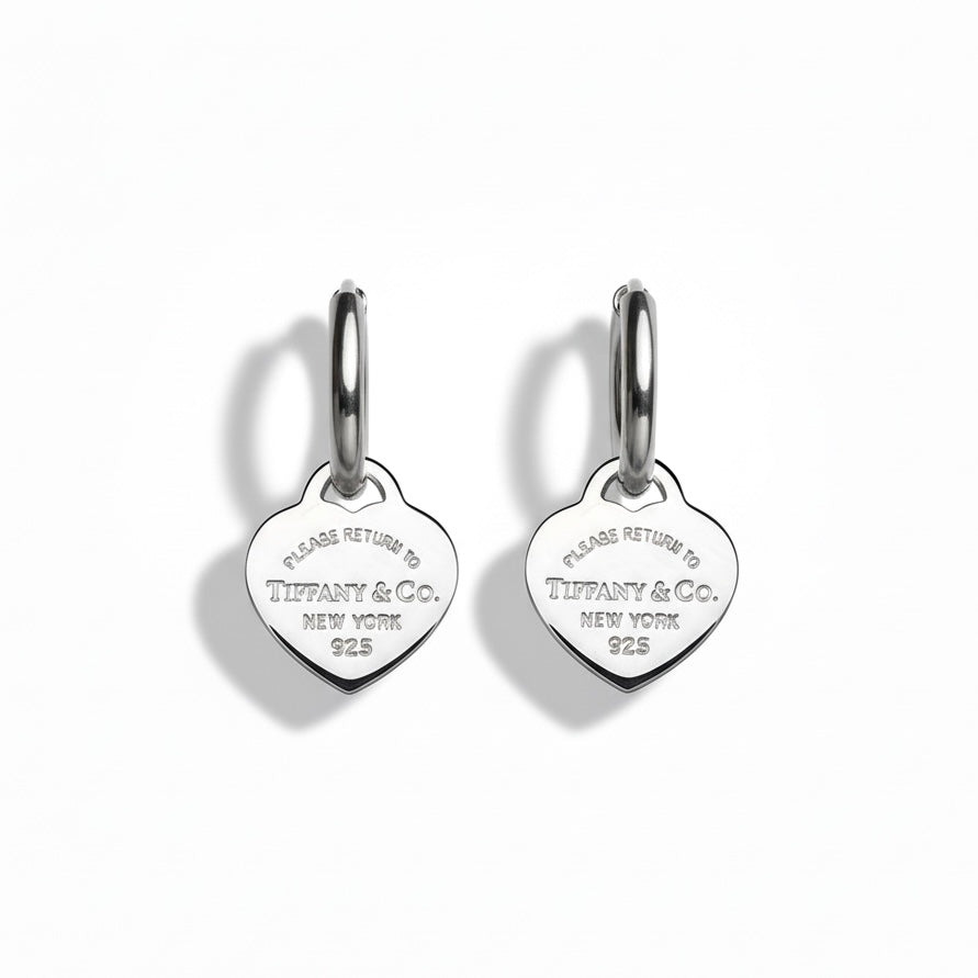 Tiffany & Co. silberne Herzanhänger an extra Kreolen