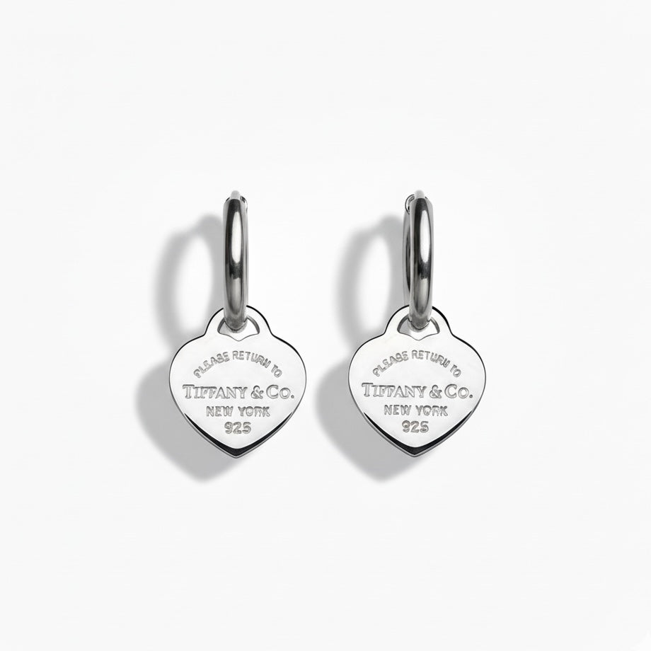 Tiffany & Co. silberne Herzanhänger an extra Kreolen