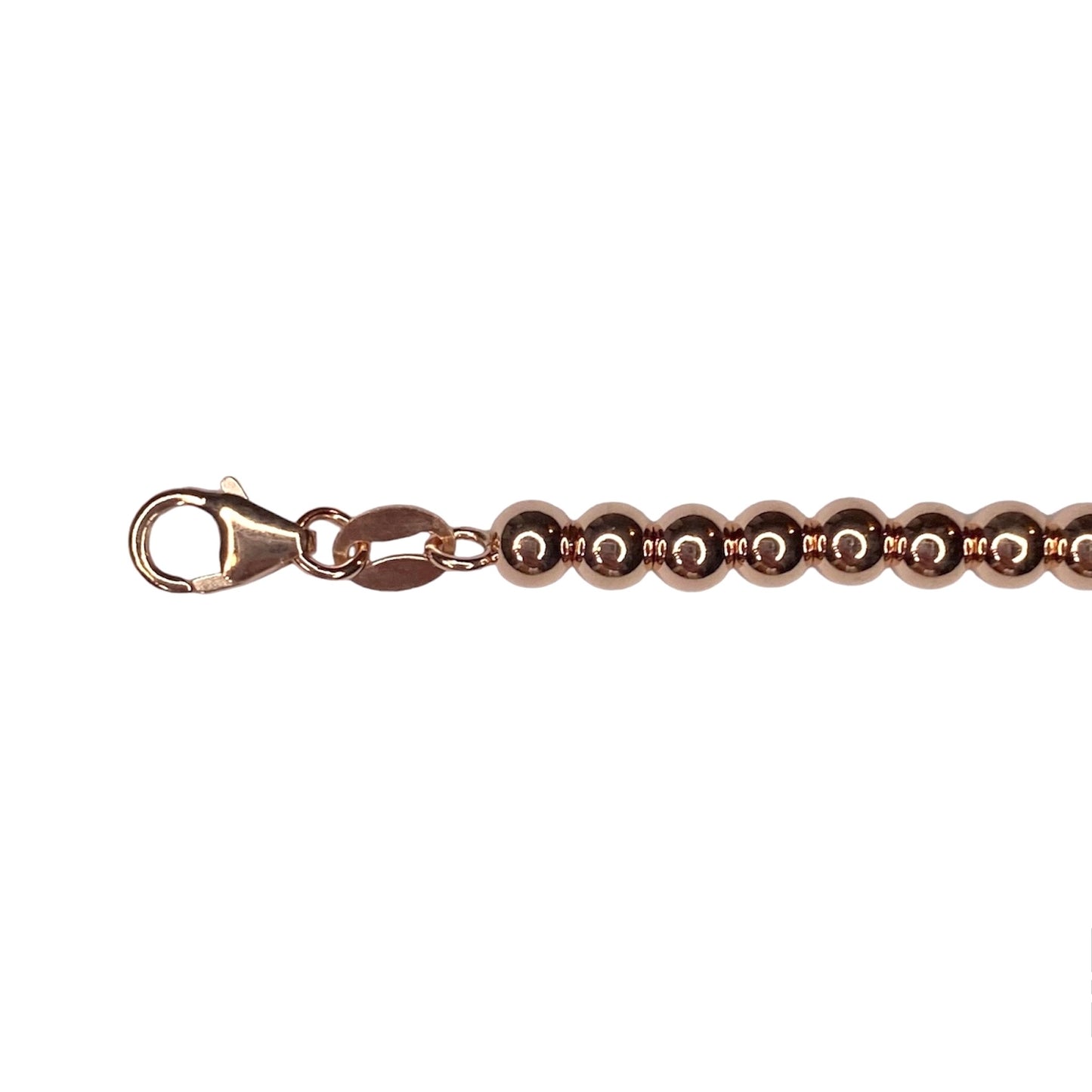 Tiffany & Co. heart pendant on a  unbranded ball bracelet in roségold