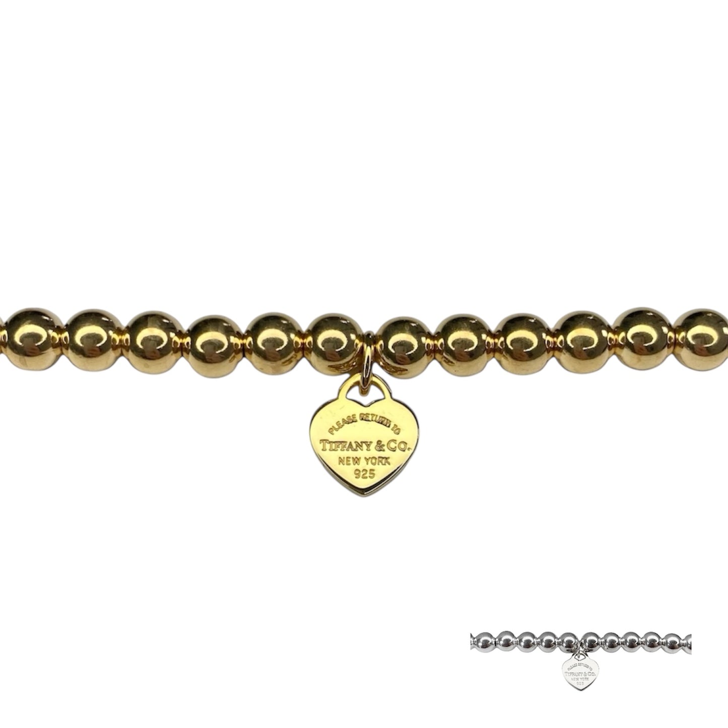 Tiffany & Co. bracelet (Tiffany heart pendant on unbranded ball bracelet) in gold